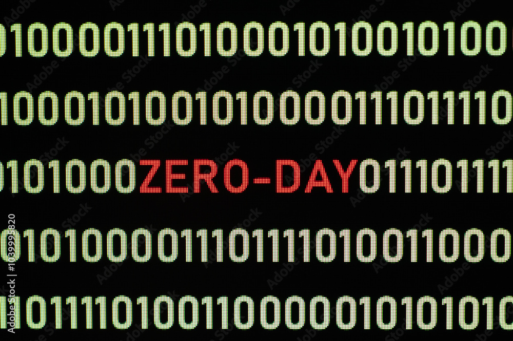 ZERO-DAY text and binary code concept from the desktop computer screen,ZERO-DAY vulnerability concept (also known as a 0-day)A zero-day vulnerability is a flaw in software or hardware. ZERO-DAY text and binary code concept from the desktop computer screen,ZERO-DAY vulnerability concept (also known as a 0-day)A zero-day vulnerability is a flaw in software or hardware.