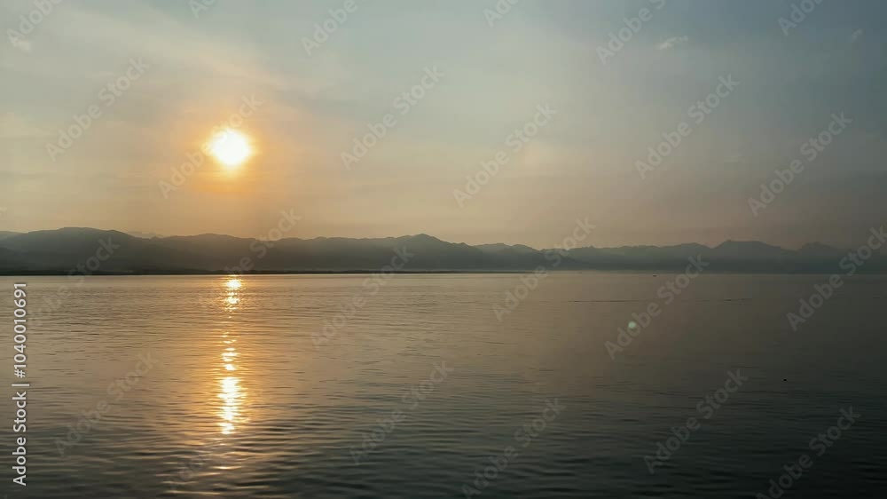 dawn over the sea and mountains, view from the ship dawn over the sea and mountains, view from the ship