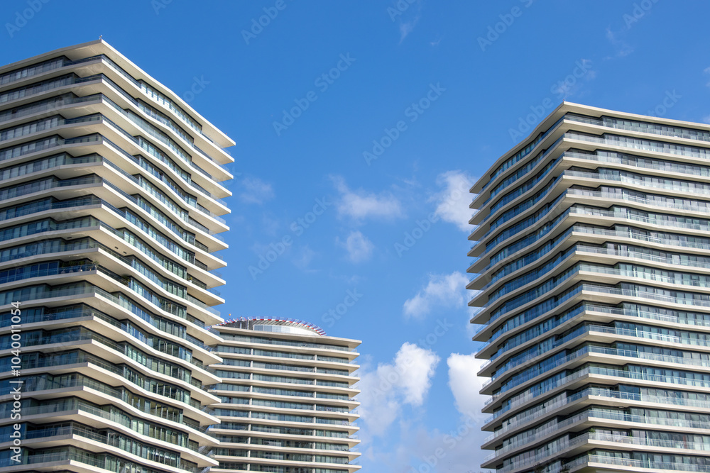 The modern skyscrapers in Istanbul, Turkey, reflect the city’s rapid urbanization and economic growth. The modern skyscrapers in Istanbul, Turkey, reflect the city’s rapid urbanization and economic growth.