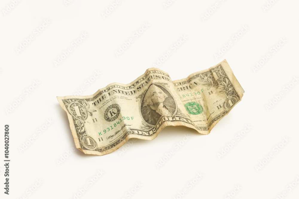 A wrinkled one dollar bill on a white background with copy space A wrinkled one dollar bill on a white background with copy space