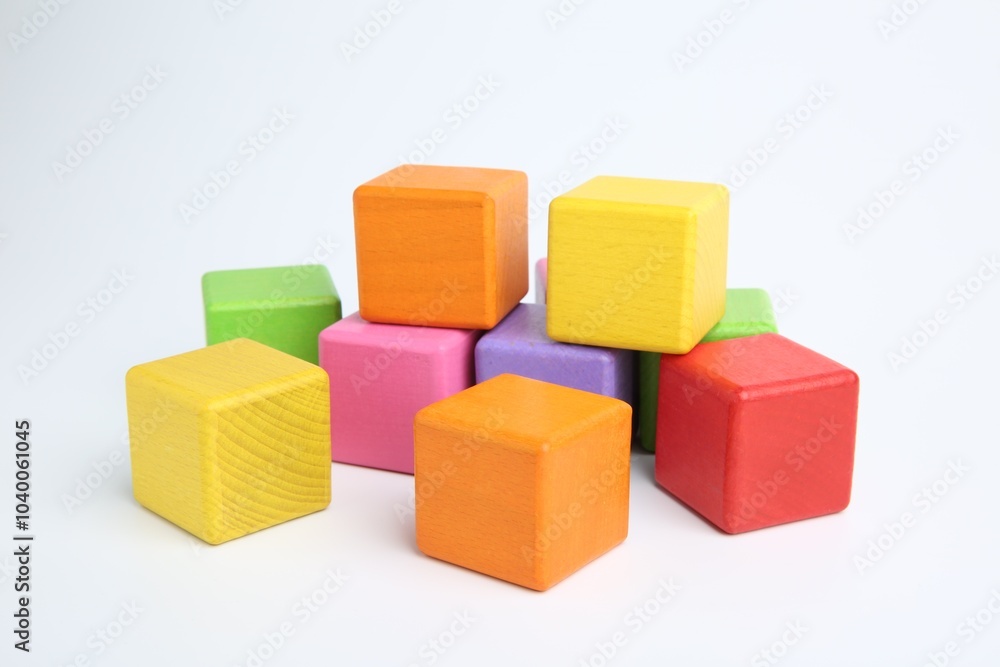 Many wooden colorful cubes on white background Many wooden colorful cubes on white background