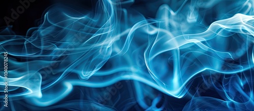 Blue incense smoke swirling in an abstract pattern creating a captivating copy space image