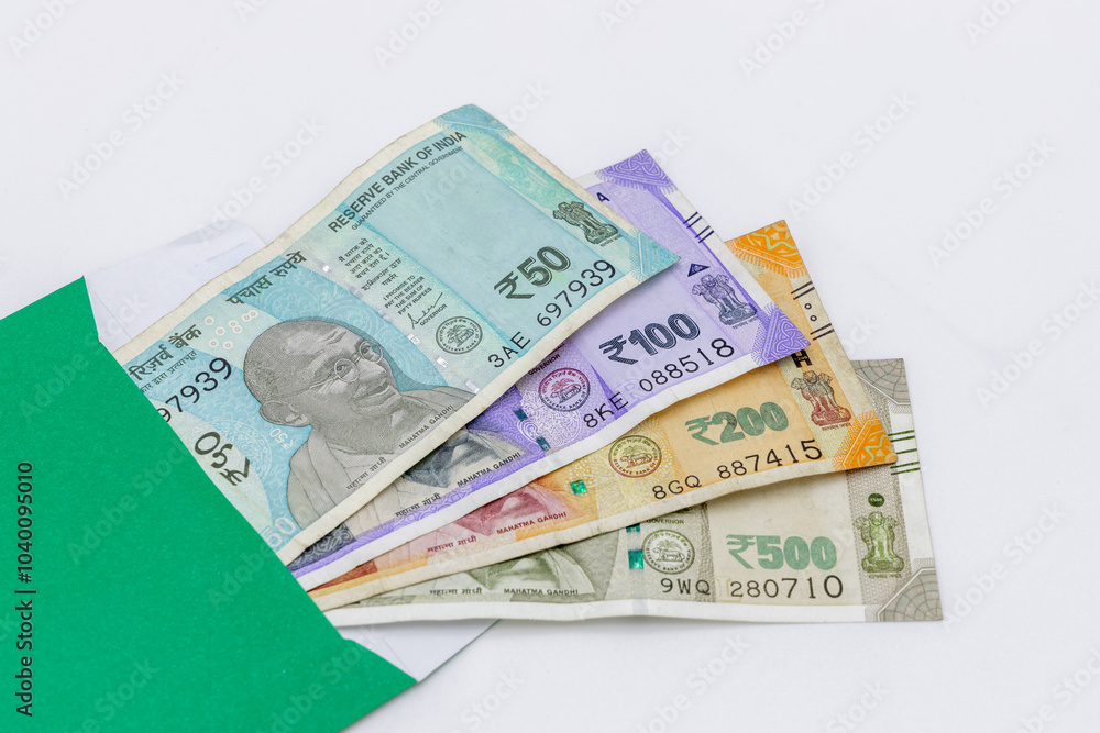 Indian currency 500 rupee bank note on white background, Five hundred Indian rupee bank paper currency note, Group of money stack of 500 Indian Rupee banknote.