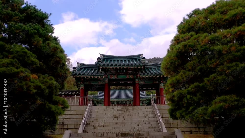 ASAN, SOUTH KOREA - OCTOBER 17, 2024: Exploring the historic gates surrounded by lush greenery at a cultural site in Asan city ASAN, SOUTH KOREA - OCTOBER 17, 2024: Exploring the historic gates surrounded by lush greenery at a cultural site in Asan city