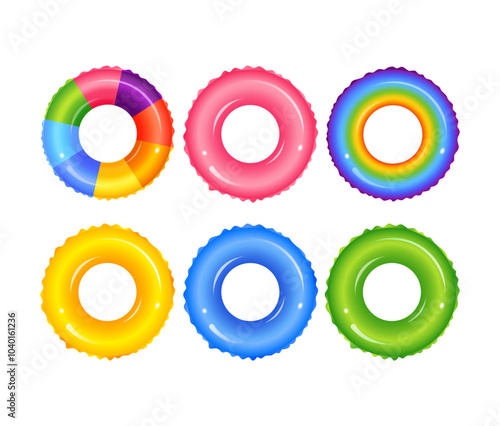 Colorful inflatable rubber rings floating on water surface