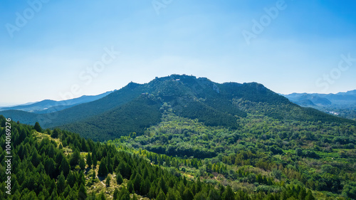 Aerial photos of the green mountains in the distance