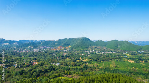 Aerial photos of the green mountains in the distance