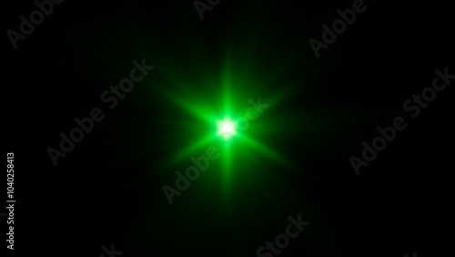 Shining green star. Bright abstract star. Cold green magic explosion.