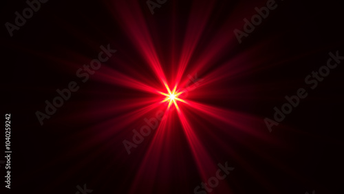 Abstract red star burst glowing with bright energetic light rays