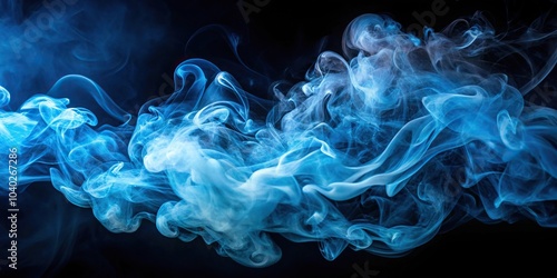 Aerial soft ethereal blue smoke patterns swirling on a dark background