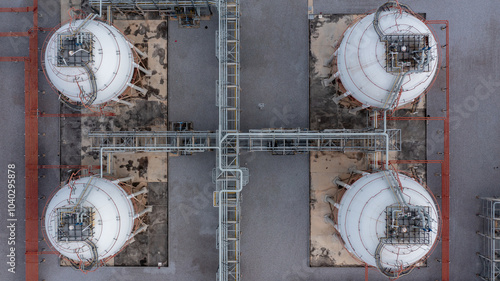 Aerial view spherical tank storage liquefied gas petrochemical, Horton sphere gas storage tank, Spherical liquefied petroleum refinery, Liquefied natural gas tank industrial spherical storage tank. photo