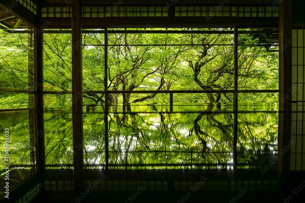 Naklejka premium View of Japanese garden of Rurikoin Temple reflecting on water in Kyoto, Japan