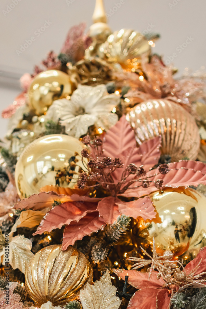 a Christmas tree in soft pink and gold tones. interior decoration at home and in the office a Christmas tree in soft pink and gold tones. interior decoration at home and in the office
