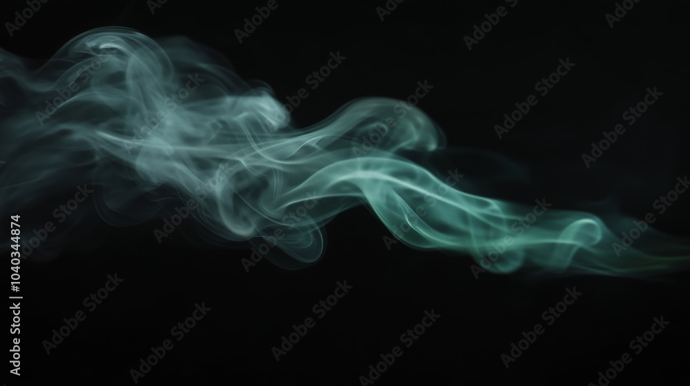 A wisp of green smoke against a black background, taken with a wide-angle lens. A wisp of green smoke against a black background, taken with a wide-angle lens.