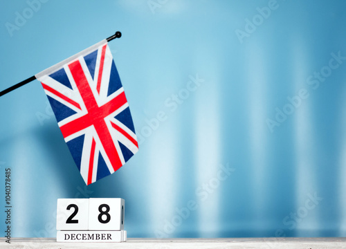 December Calendar With British Flag With Number 28. Calendar cubes with numbers. Copy space.