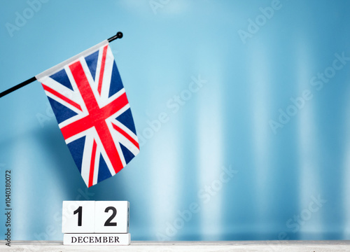 December Calendar With British Flag With Number 12. Calendar cubes with numbers. Copy space.