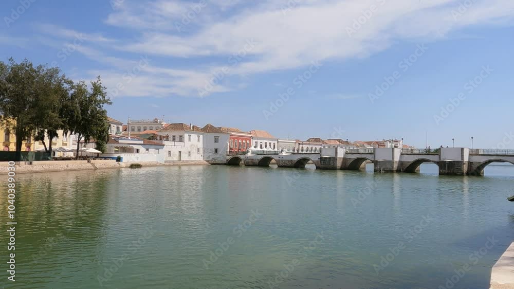 The river reflecting the blue sky and surrounding nature, gently disturbed by a soft summer breeze.
The river reflecting the blue sky and surrounding nature, gently disturbed by a soft summer breeze.