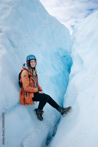 Woman is hiking on Matanuska Glacier near Glenn Highway in Alaska. photo