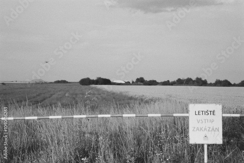 airport in Panensky Tynec in Czechia on 8. July 2024 on black and white film - blurriness and noise of scanned 35mm film were intentionally left in image photo