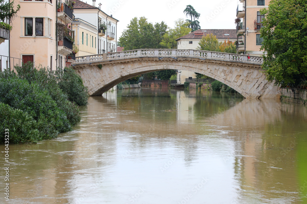 Ancient Bridge called PONTE SAN MICHEL in Vicenza City in Northern ITALY during the flood and the RETRONE river Ancient Bridge called PONTE SAN MICHEL in Vicenza City in Northern ITALY during the flood and the RETRONE river