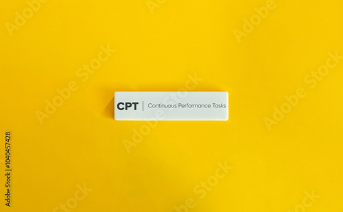 Continuous Performance Tasks (CPT). Measuring Attention Span. Letter Tiles on Yellow Background. Minimal Aesthetic. photo