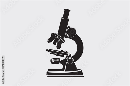 Silhouette of a classic laboratory microscope.