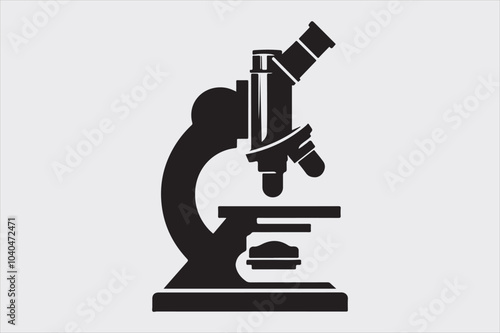 Silhouette of a classic laboratory microscope.