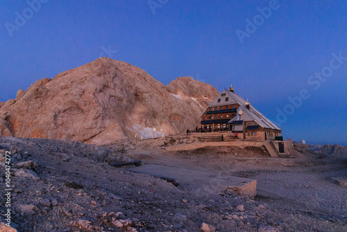 Obraz na płótnie Mountain Triglav during blue hour in the Slovenian Alps Julian Alps with triglav mountain hut in foregroung w salonie