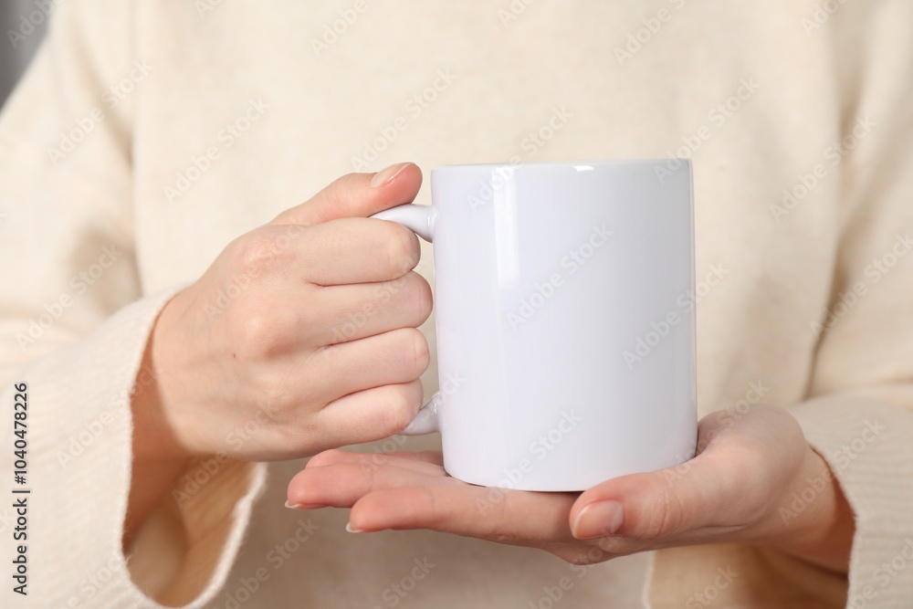 Woman with white ceramic cup, closeup. Mockup for design Woman with white ceramic cup, closeup. Mockup for design
