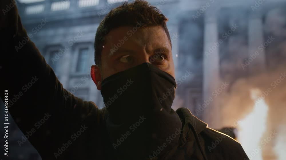 Mysterious Masked Man At Night With Fire Urban Protest Rebellion Intensity Mysterious Masked Man At Night With Fire Urban Protest Rebellion Intensity