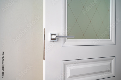 Modern white wooden door close-up