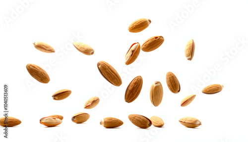 Whole, shelled and blanched almond nuts flying isolated on white background. Vertical layout isolated with white highlights, png