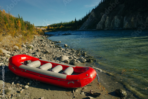 CHATANIKA RIVER, ALASKA, USA - sep 2 2024 Raft on River Chatanika in places where the river crosses with Steese Highway, Alaska photo