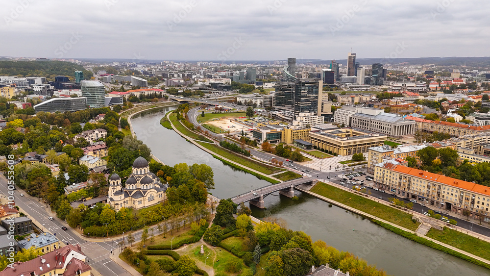 Obraz premium Beautiful Aerial view of the old town of Vilnius, the capital of Lithuania. Top cinematic aerial view. Vilnius cityscape in a beautiful autumn day, Lithuania. 