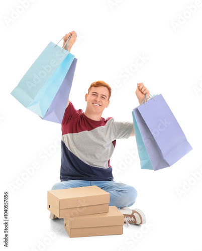 Young redhead man with shop...