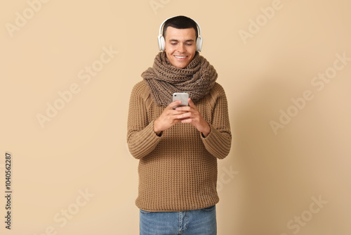 Young man in winter clothes...