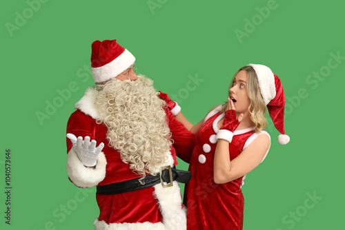 Surprised santa claus and m...