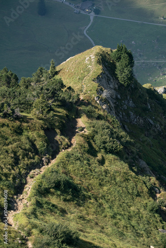 Breathtaking hike along steep paths up from the Eigental valley to the summit of Mittaggüpfi and Pilatus, Switzerland. photo