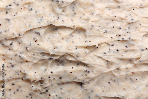 Creamy facial scrub texture...
