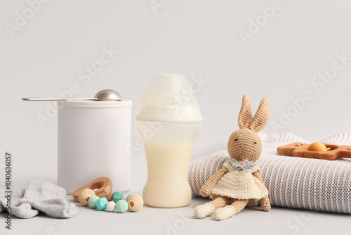 Bottle with baby milk formu...