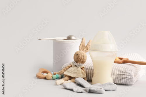 Bottle with baby milk formu...