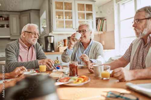 Wallpaper Mural Diverse senior friends eating breakfast together at kitchen table Torontodigital.ca