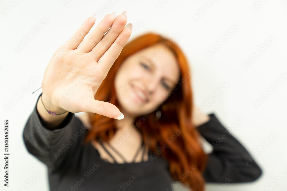 Happy portrait of redhead young woman in studio Happy portrait of redhead young woman in studio