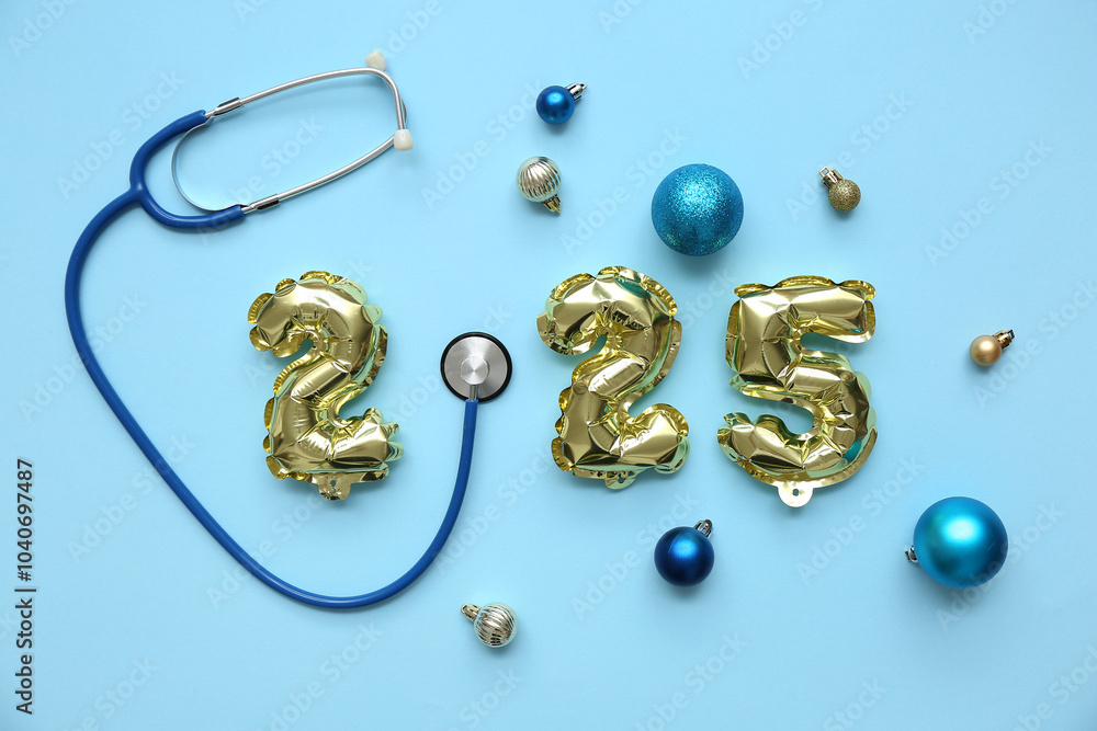Figure 2025 with stethoscope and Christmas balls on blue background Figure 2025 with stethoscope and Christmas balls on blue background