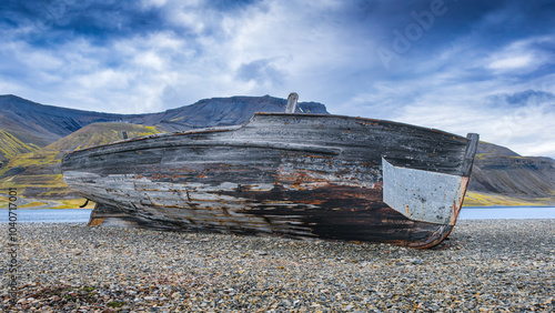 old boat wreck on the beach photo