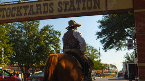 Foto Cowboy riding a horse at the Fort Worth Stockyards, Texas USA