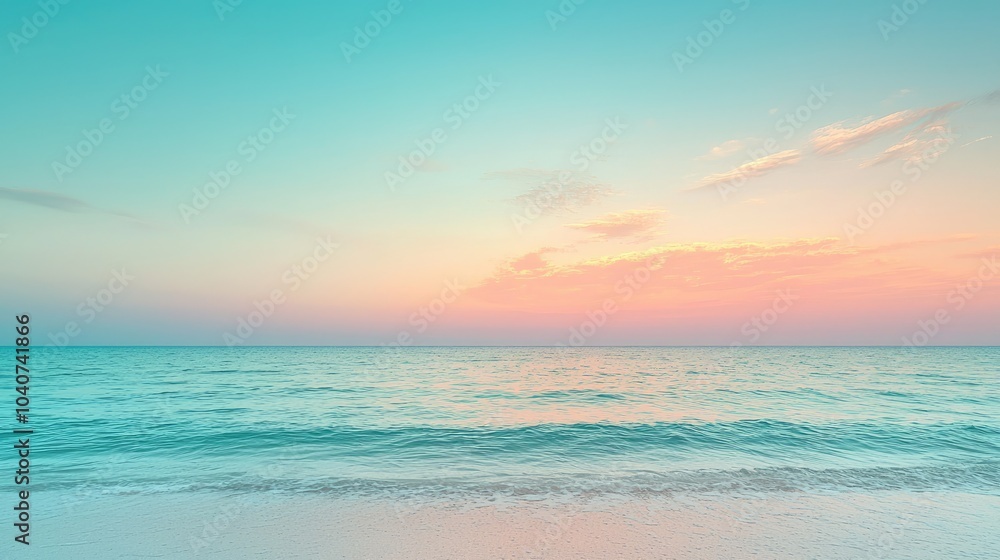 Obraz premium Calm ocean waves gently lapping on a white sandy beach at sunset, with a soft blue and pink sky.