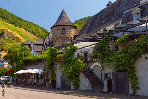 Wallpaper Mural A historic house with a stone tower and terrace covered in vines in Beilstein, Germany Torontodigital.ca