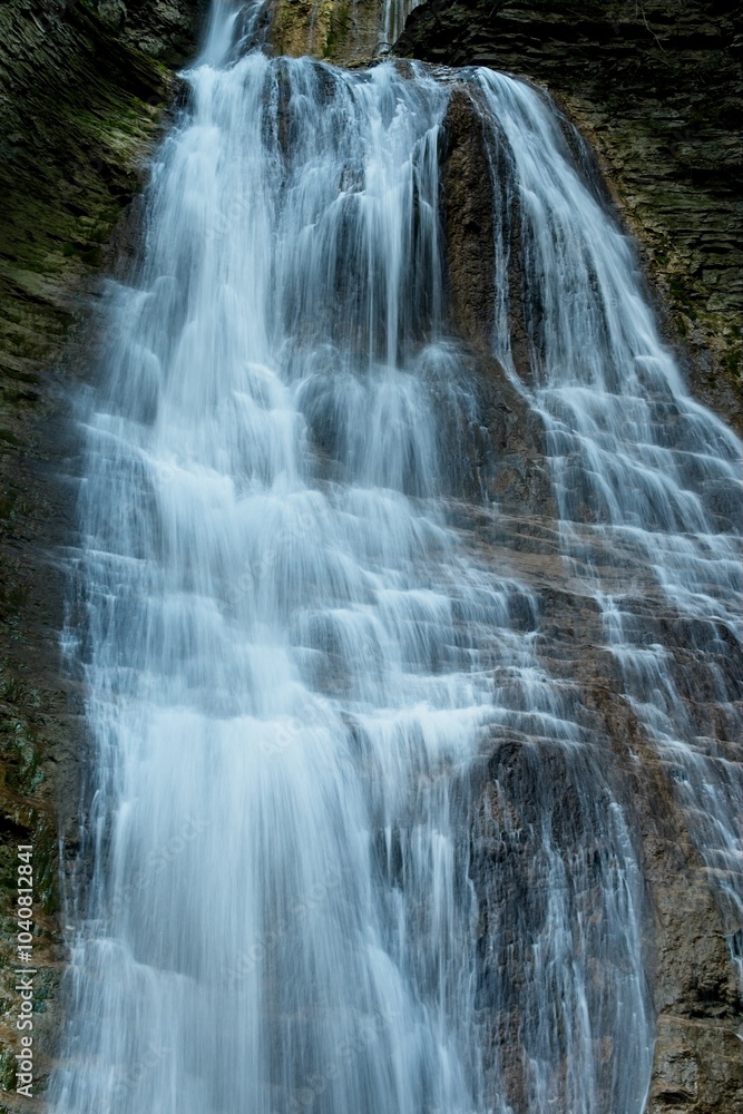 Cascading Waterfall in Rocky Landscape Cascading Waterfall in Rocky Landscape