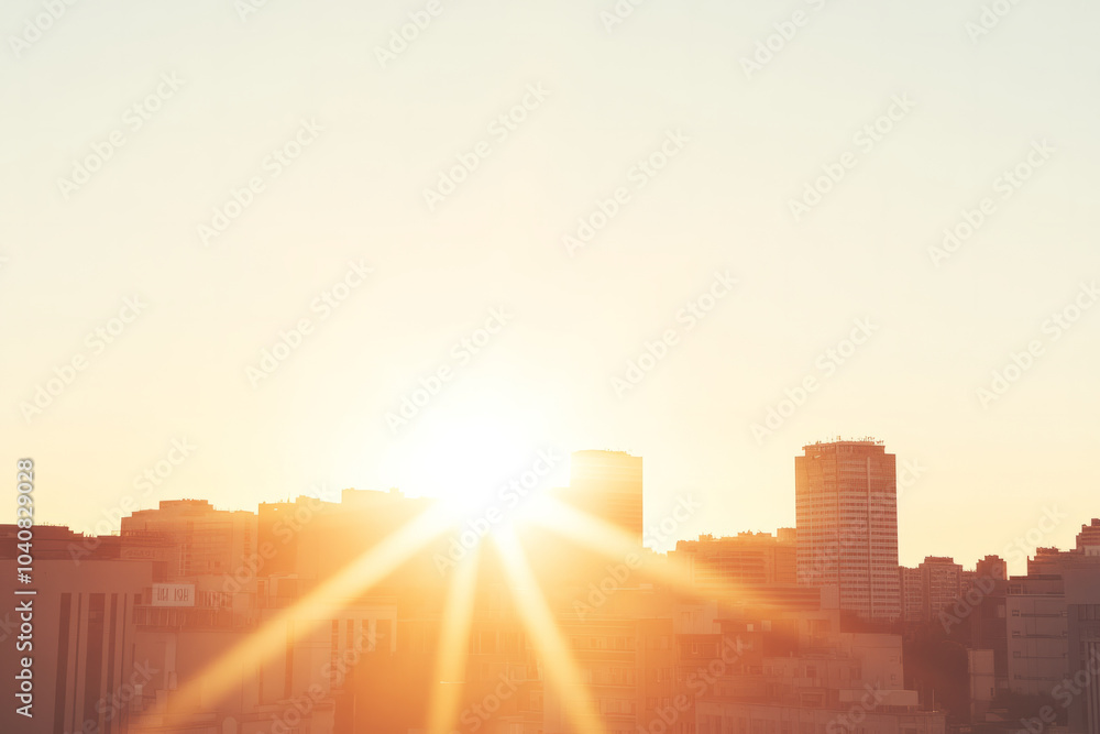 The sun is shining brightly over a city skyline The sun is shining brightly over a city skyline